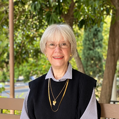 Medicare Specialist Marilyn Robertson Smiling Outdoors